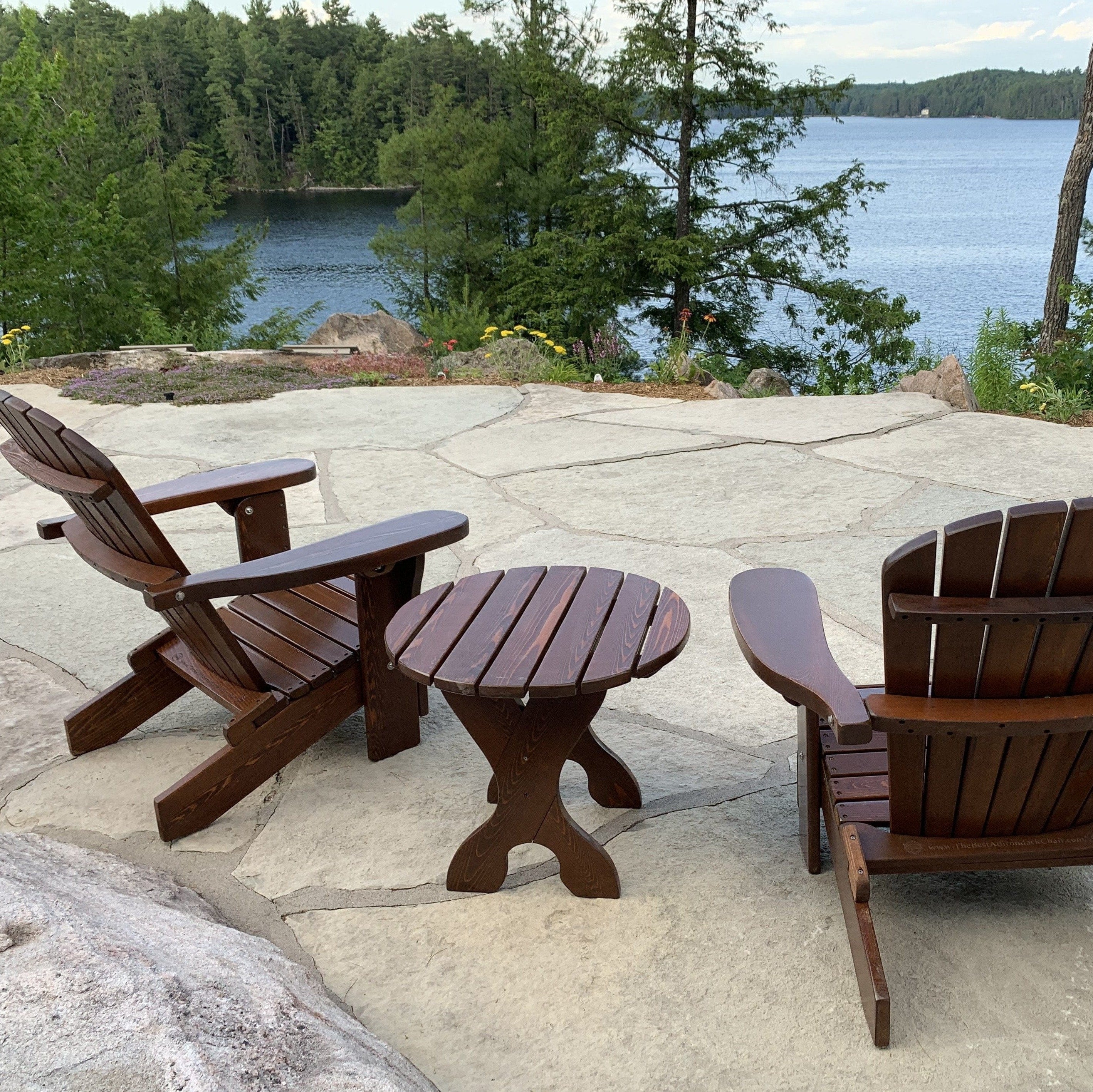 Adirondack chairs on the lake side
